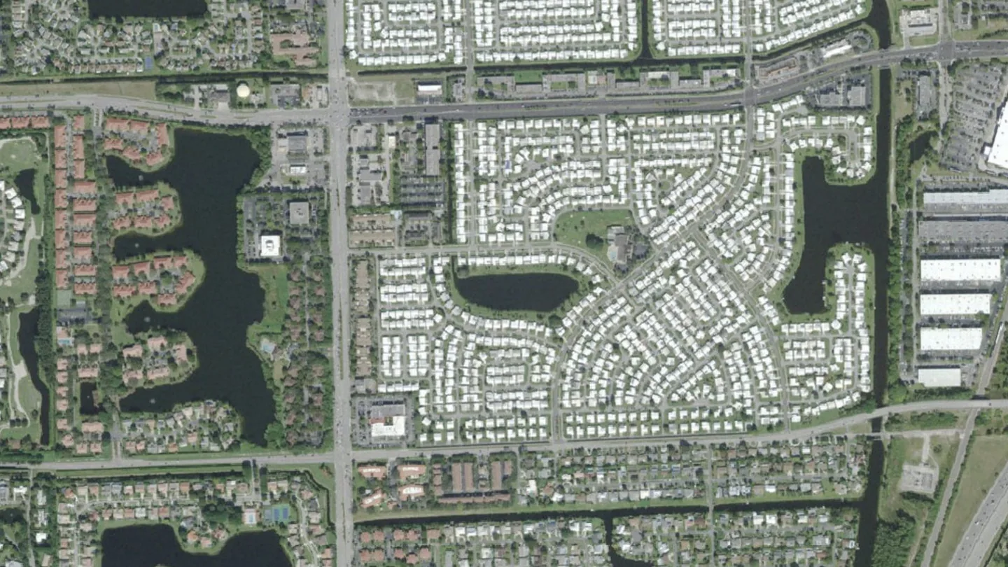 Aerial view of homes, lakes and streets in Boynton Beach, septic tank pumping